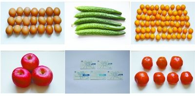 图为林道藩分别用10元钱买到的六样东西: 鸡蛋 黄瓜 金桔 苹果 地铁票 西红柿 图为林道藩分别用10元钱买到的六样东西: 鸡蛋 黄瓜 金桔 苹果 地铁票 西红柿